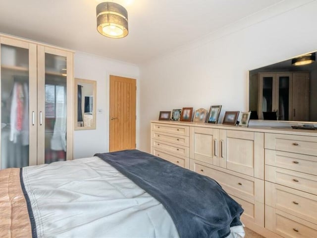 The second bedroom from a different angle -- and an example of the fitted wardrobes and storage space that can be found in most of the bedrooms.