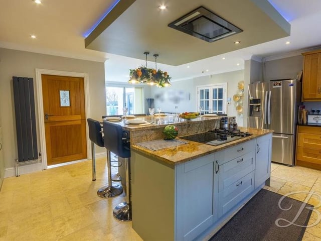 The kitchen really is the perfect place to embrace your culinary skills. The units and cabinets are complemented by a work surface over and a Belfast sink. There are two windows at the front and a pair of sliding doors leading into the garden.