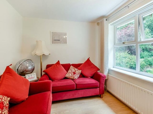 The fifth bedroom, which overlooks the back of the £720,000 property, is a versatile space that could be used for other things. It has a wood-effect laminate floor.