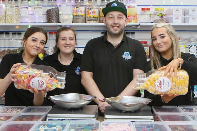 Bradley Mower celebrates the first anniversary of Mr Munchies with wife Rebecca and daughters Chloe, left, and Lillie.