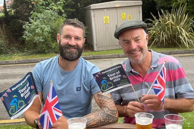 Having a pint and getting ready for riders to cycle past in Mansfield Woodhouse.