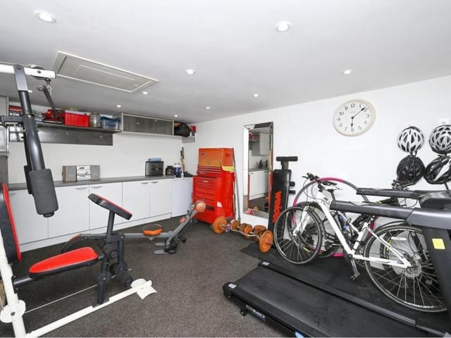 And this is what you've been waiting for, isn't it? One of the brick-built outbuildings (formerly a garage) has been converted into this richly equipped gym.