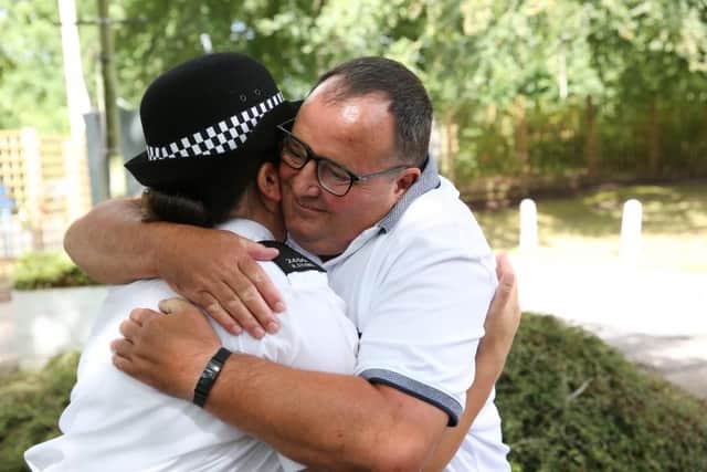 The pair hug as Rachel said her dad's career inspired her to become a cop.