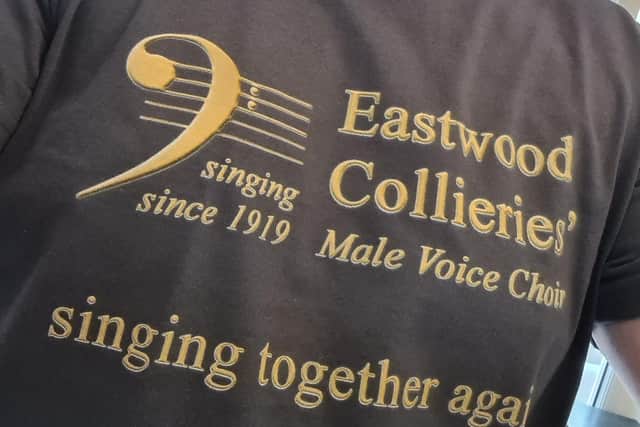 The T-shirt that says it all as the choir makes its comeback after a three-year lay-off.