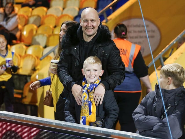 Mansfield Town fans watching the draw with Wrexham.