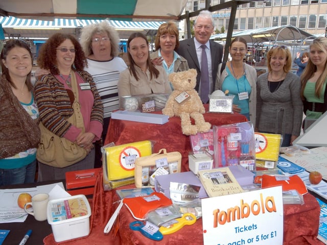 Tony Egginton, former Executive Mayor pictured with stall holders at the Volunteers Fair held in the Market Place in 2007.