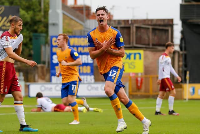 Oli Hawkins celebrates his opening goal against Bradford City, Pic Chris Holloway
