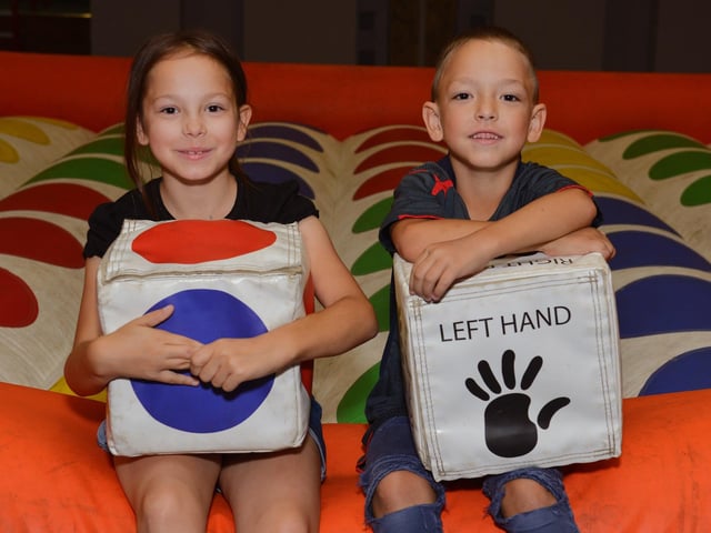 Giant inflatable twister game at Mansfield Museum in 2018, pictured are Faye Kirby, 10 and Charlie Kirby, seven