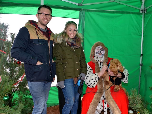 Santa Paws Dog Grotto at Sherwood Forest in aid of Jerry Green Dog Rescue, Pictured are Joe Masson and Amy Unwin with dog Bailey