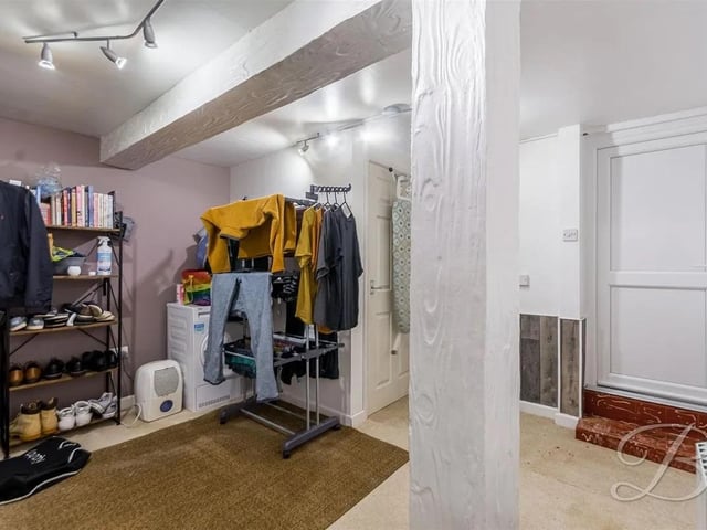 A notable feature of this property is the large basement, which adds significant value and functionality to the home. The basement includes a laundry room, WC, a tool room, and a garage, providing ample storage and utility space for all your needs.