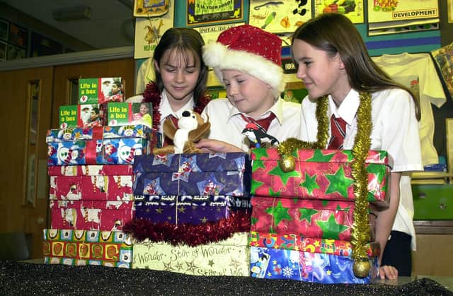 Who can you spot in these Christmas Shoe Box appeals from yesteryear?