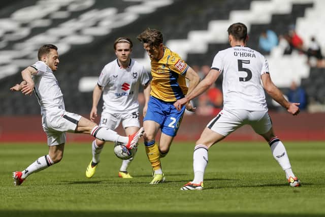 Will Swan during the Sky Bet League 2 match against MK Dons at Stadium MK, 13 April 2024 Photo credit Chris & Jeanette Holloway / The Bigger Picture.media
