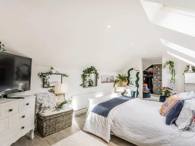 The master bedroom is a retreat having three velux windows, wooden flooring, central heating radiator, spotlighting, TV point and accessed through an interior fire door. There is also access to it's very own dressing room.