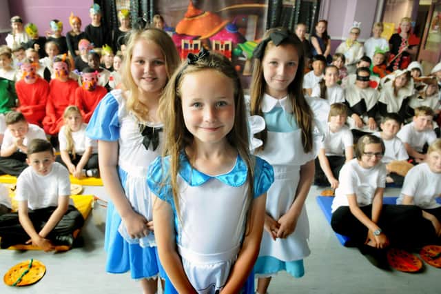 Do you recognise anyone from the 2014 cast of Alice in Wonderland which was performed at the school?