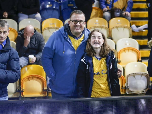 Mansfield Town fans watching the draw with Wrexham.