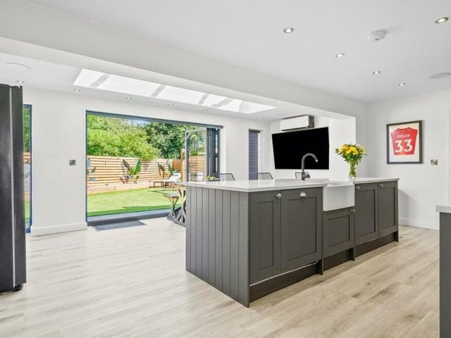 Let's start with the best first as we go on a tour of the Mansfield Woodhouse property -- and that means marvelling at this spectacular open-plan kitchen and dining area.