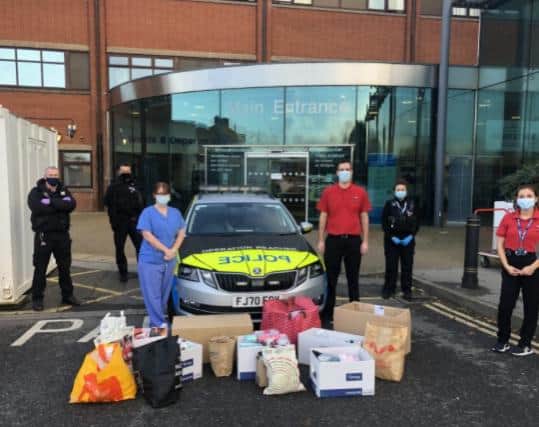 PCs Ebony Robinson, Dean Fenton and Simon Johnson along with staff from Bassetlaw District General Hospital