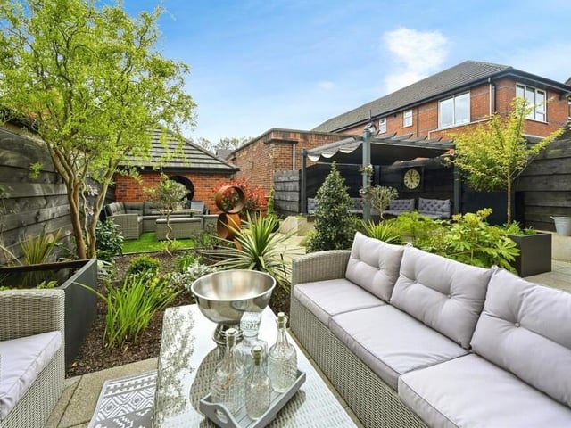 The drinks are on ice and ready to be served on this pleasant patio seating area in the back garden of the £400,000 Mansfield property.