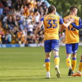 Mansfield Town defender Riley Harbottle celebrates his goal with John-Joe O'Toole during the Sky Bet League 2 match against Tranmere Rovers FC at the One Call Stadium