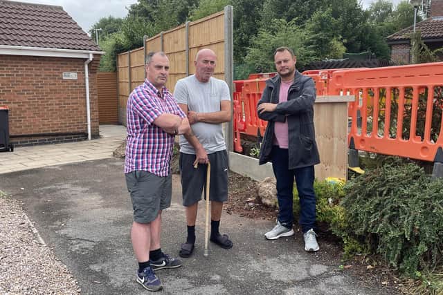 Councillors David Hennigan, Paul McSorley and Jason Zadrozny on Bramley Court.