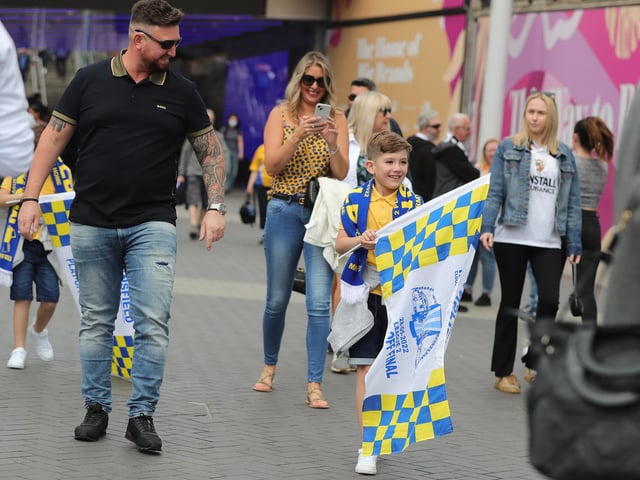 Mansfield Town fans watch the drama unfold inside Wembley.