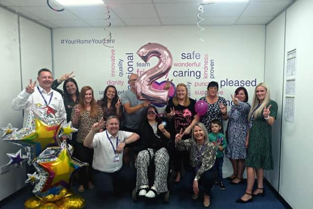 Staff, clients and families are all smiles as celebrations commence.