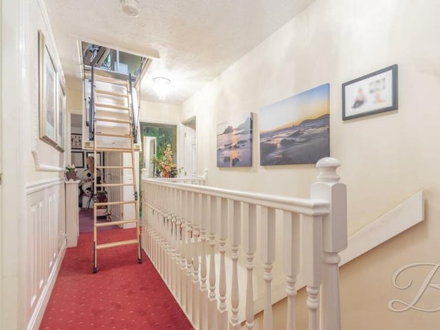The first-floor landing includes access to the loft, via a remote-controlled, electric ladder.