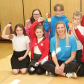 Rebecca Adlington shows off her Olympic medals to children during a visit to Crescent Primary School in Mansfield.