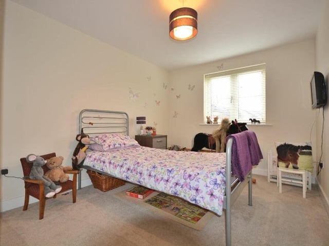 Time to go upstairs now and here is the first of the four bedrooms at the Adams Park Way property. Ideal for a child, it is a good size and has access to an en suite shower room.