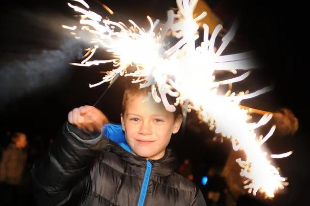 Eight-year-old Ashton Buttery lights up the night as he waves a sparkler during the 2016 fireworks display at Debdale Lane Sports Ground