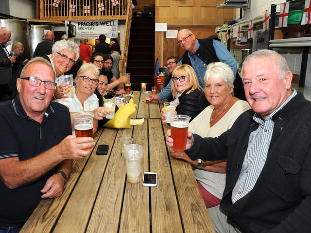 Cheers from visitors to the Priors Well Brewery mini beer festival at the Mansfield Woodhouse outlet in 2017.