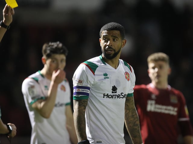 Joss Labadie of Walsall is shown a yellow card. It was one of 75 yellows.