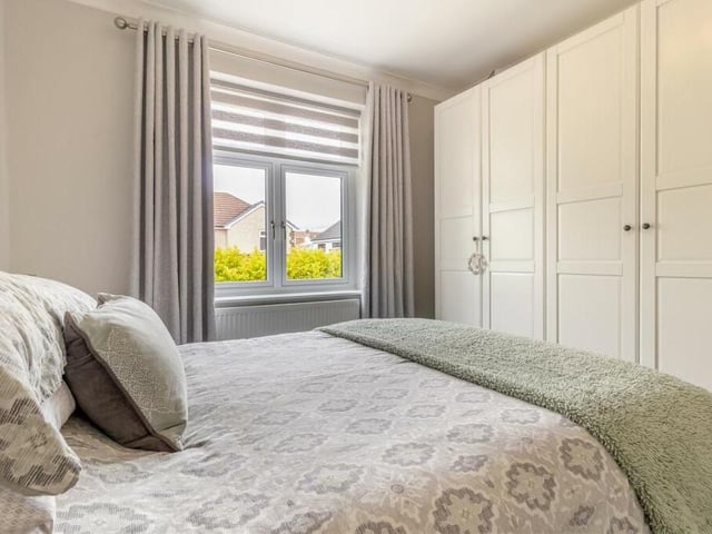 The second double bedroom is as well presented as the first and also includes fitted wardrobes with hanging rails and shelving. It overlooks the front of the Oakland Road bungalow.