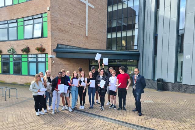 Students pictured with Chris Vallance, strategic director of student experience.