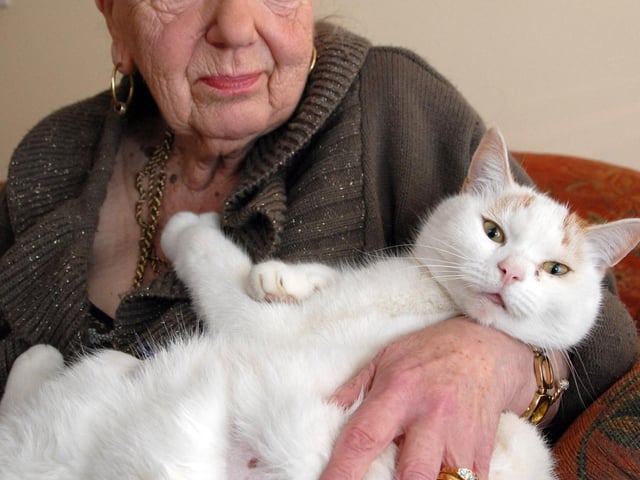 Theresa Bellamy of Sutton is pictured with her cat Bell.