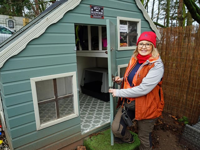 Denise Hardwick with Billy's bungalow. The dogs are given a safe space to adhere to their needs.