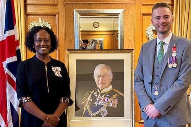 Special Inspector Ryan Clarke was presented with his British Empire Medal (BEM) by Lord-Lieutenant of Nottinghamshire Veronica Pickering. Photo: Nottinghamshire Police