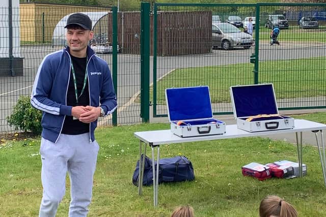 British featherweight boxing champion Leigh Wood gives a talk to the Wellbeing Warriors at Leamington Primary Academy in Sutton.