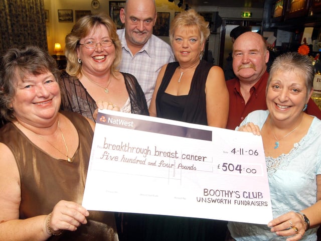 Mansfield's Boothy's Club and the Unsworth Fundraisers raised £504 for Breakthrough Breast Cancer from a Pink Party and a Motown event held at Kirkby's Festival Hall. Pictured from the left; Jenny Booth owner of Boothy's Club, Landlady Annette King and Unsworth Fundraisers Steve and Elaine Hollingsworth and Dave and Jenny Unwin. Year: 2006.