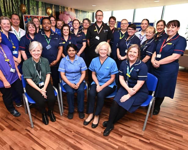 Dame Ruth May and Kate Brintworth with members of the Maternity team at King's Mill Hospital.