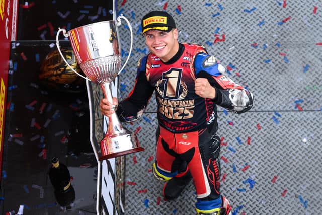 Kyle Ryude is all smiles with his champion's trophy. All photos by Michael Hallam.