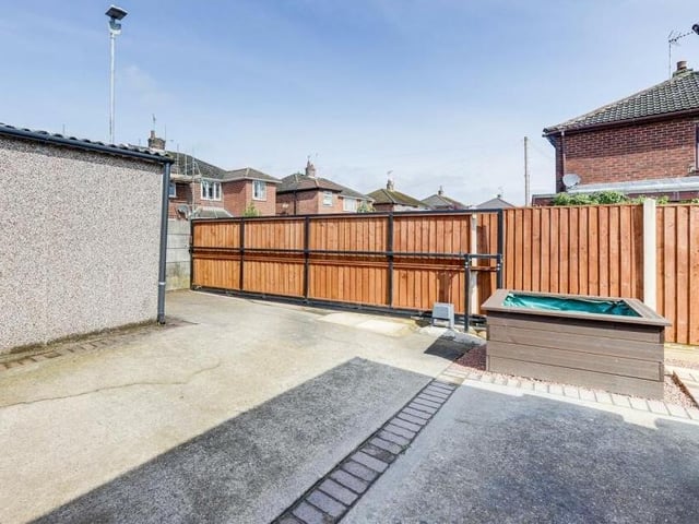 The enclosed rear garden at the £260,000 Kirkby bungalow even has space for a hot tub, if that's what takes your fancy.