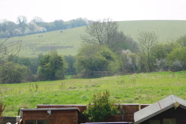 The view from Hannah Tomlinson's home showing the field which will become 200 houses and the historic landfill which is often overlooked as a natural hill.
