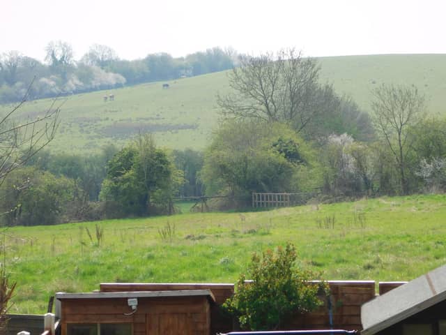 The view from Hannah Tomlinson's home showing the field which will become 200 houses and the historic landfill which is often overlooked as a natural hill.