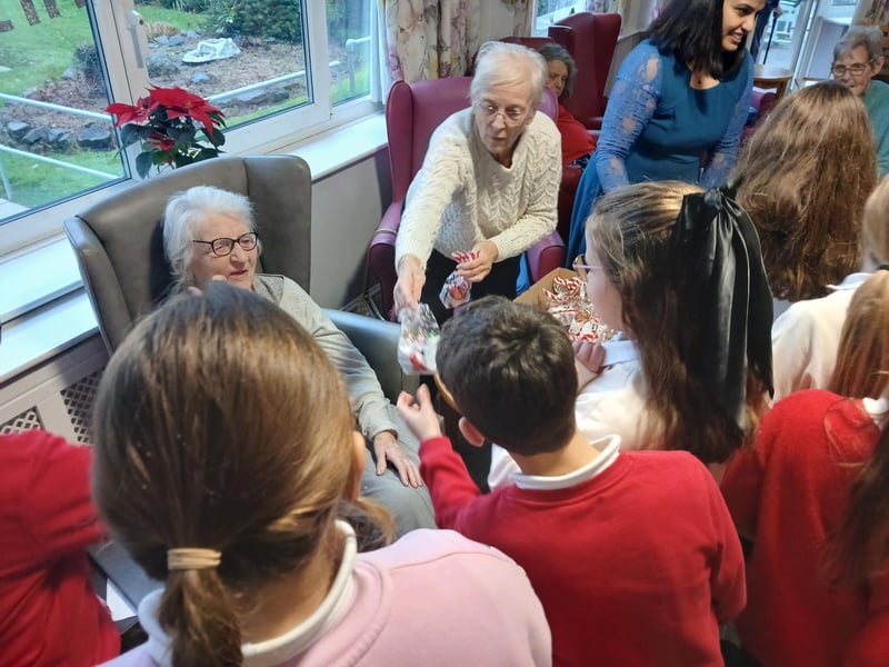 Pupils receive gifts from residents