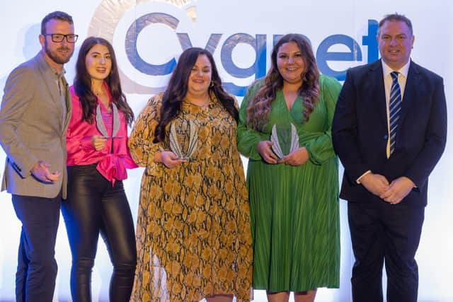 Megan Bradley, second from left, receives her Cygnet Health Care award.