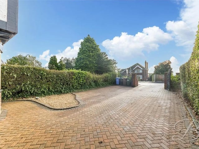 The large private driveway allows space for both off-road parking and secure storage.