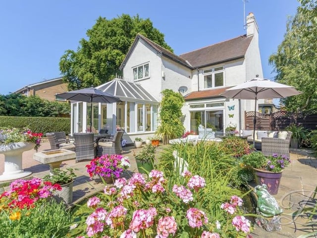 While we're in the conservatory at the £575,000 property, here's what it looks like from the outside. It leads out to delightful patio seating area in the garden.