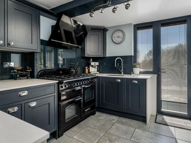 Marvel at the beautiful, hand-made kitchen that has a range of matching wall and base-level units, quartz work surfaces and Belfast sink. A range cooker is available to buy by separate negotiation.