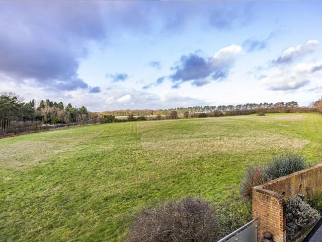 The property boasts sweeping gardens, established paddocks and a selection of substantial outbuildings